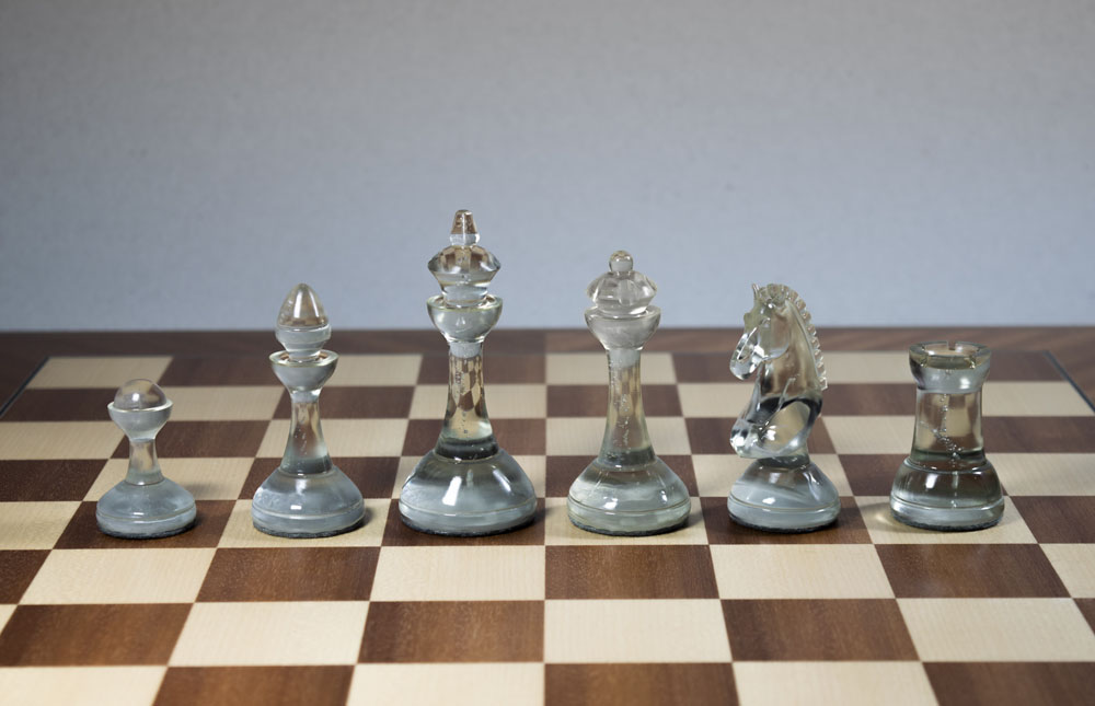 Ecliptic chess pieces printed in transparent resin